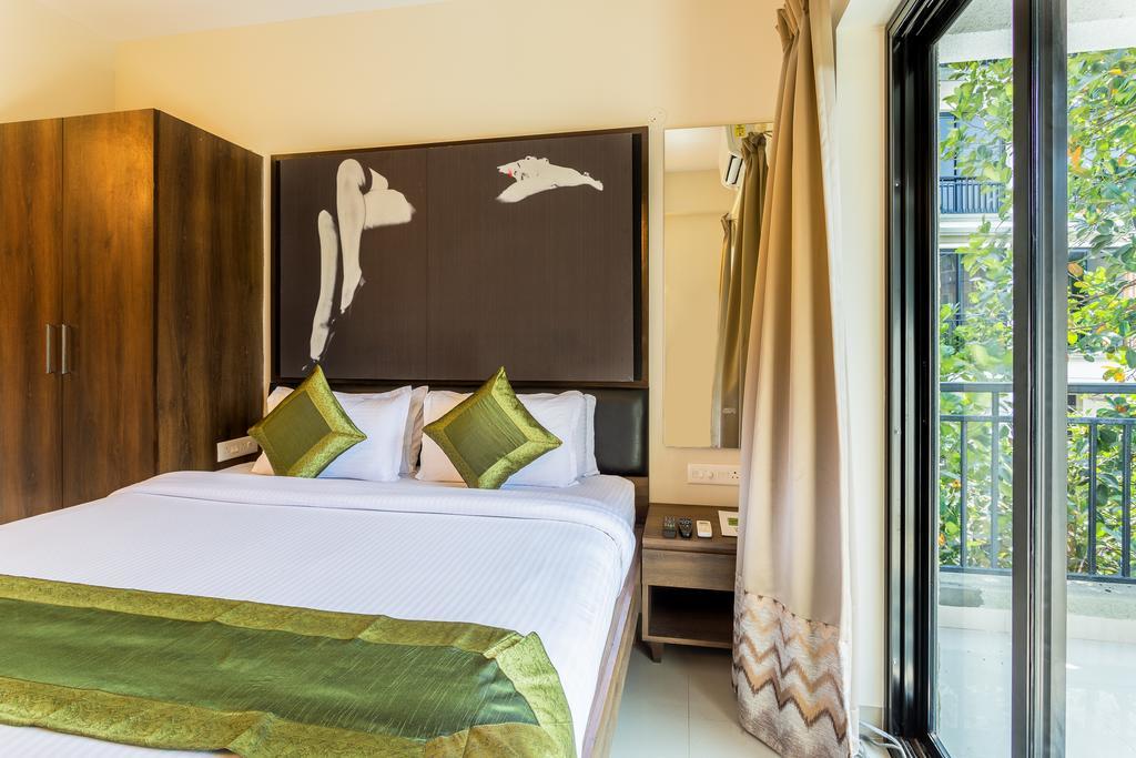 Treebo Trend Zeebo Suites Arpora Exteriör bild